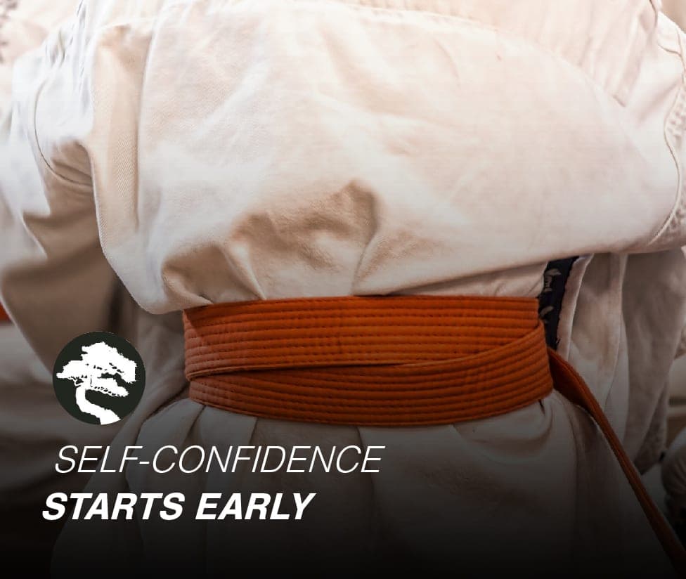 Close-up of a young student's orange karate belt, captioned 'Self-confidence starts early.'