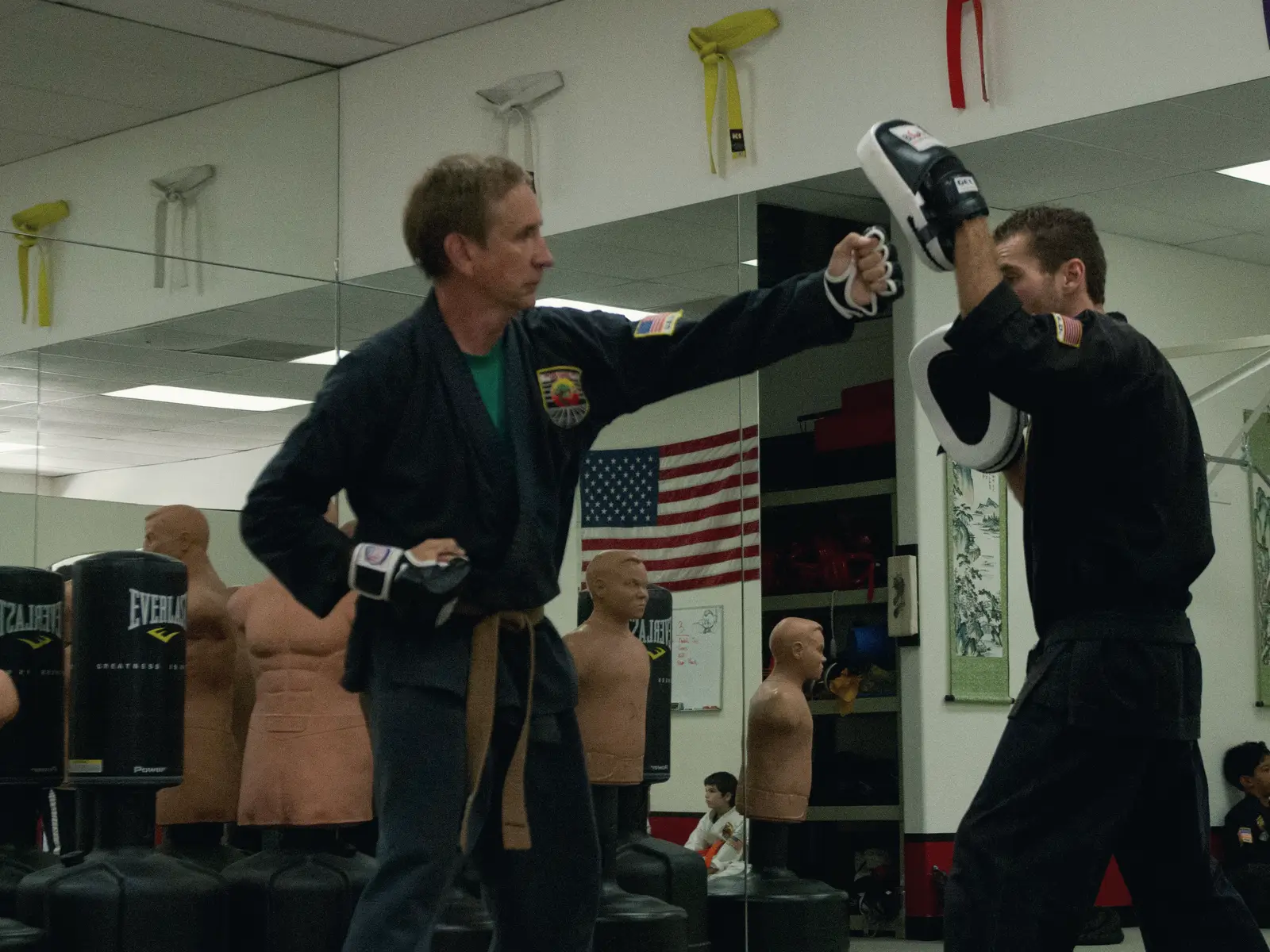 Two adult students working focus mitts during an adult karate class at USSD Santa Barbara.